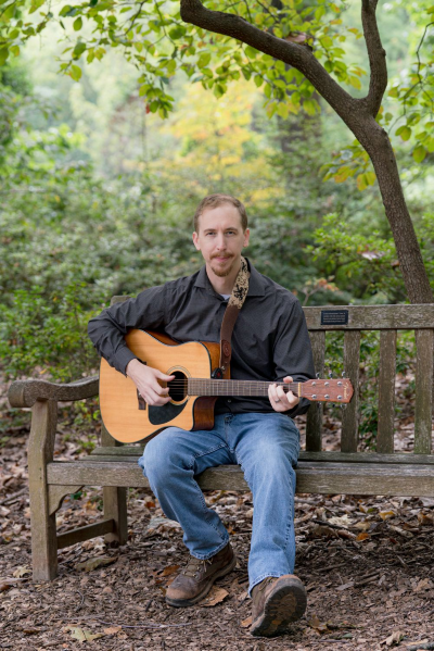 Portrait of Philly Rivers, a musician and songwriter